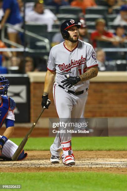 Matt Adams of the Washington Nationals hits a solo home run in the eighth inning against the New York Mets at Citi Field on July 13, 2018 in the...