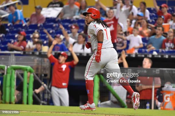 Maikel Franco of the Philadelphia Phillies looks out towards left field after hitting a home run in the ninth inning against the Miami Marlins at...