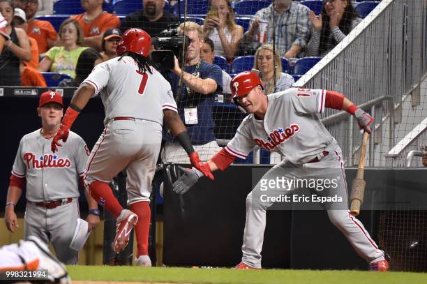 Maikel Franco of the Philadelphia Phillies is congratulated by Andrew Knapp after hitting a home run in the ninth inning against the Miami Marlins at...