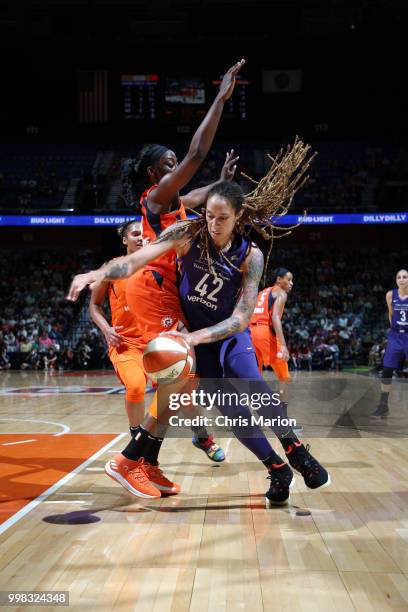 Brittney Griner of the Phoenix Mercury handles the ball against the Connecticut Sun on July 13, 2018 at the Mohegan Sun Arena in Uncasville,...