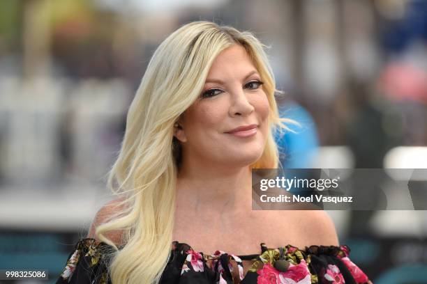 Tori Spelling visits "Extra" at Universal Studios Hollywood on July 13, 2018 in Universal City, California.