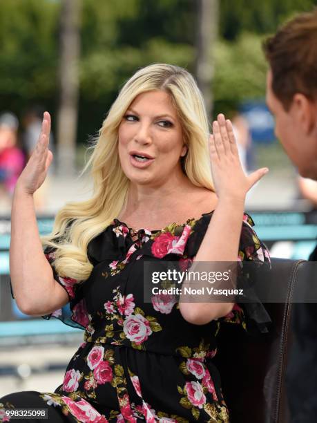 Tori Spelling visits "Extra" at Universal Studios Hollywood on July 13, 2018 in Universal City, California.