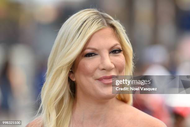Tori Spelling visits "Extra" at Universal Studios Hollywood on July 13, 2018 in Universal City, California.