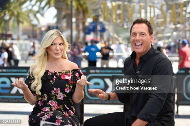 Tori Spelling and Mark Steines visit "Extra" at Universal Studios Hollywood on July 13, 2018 in Universal City, California.