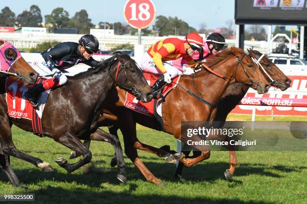 Noel Callow riding Magnesium Rose wins Race 2 during Melbourne Racing at Caulfield Racecourse on July 14, 2018 in Melbourne, Australia.