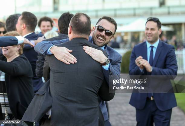 Connections of Magnesium Rose celebrate after winning the Ladbrokes Back Yourself Handicap at Caulfield Racecourse on July 14, 2018 in Caulfield,...