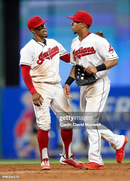 Francisco Lindor of the Cleveland Indians celebrates with Michael Brantley after the Indians defeated the New York Yankees at Progressive Field on...