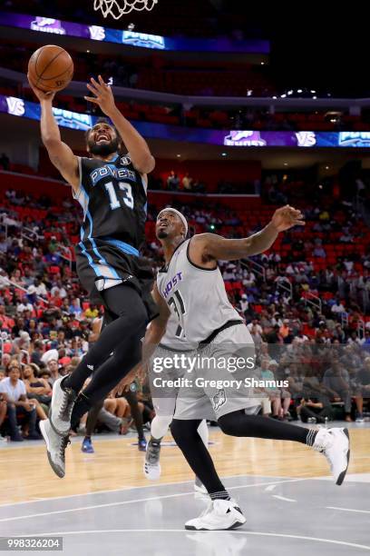Xavier Silas of Power attempts a shot while being guarded by Ricky Davis of the Ghost Ballers during BIG3 - Week Four at Little Caesars Arena on July...
