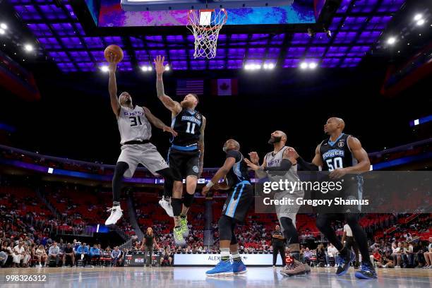 Ricky Davis of the Ghost Ballers attempts a shot while being guarded by Chris Andersen of Power during BIG3 - Week Four at Little Caesars Arena on...