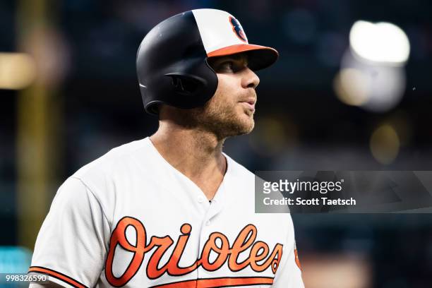 Chris Davis of the Baltimore Orioles looks on after striking out against the Philadelphia Phillies during the seventh inning at Oriole Park at Camden...