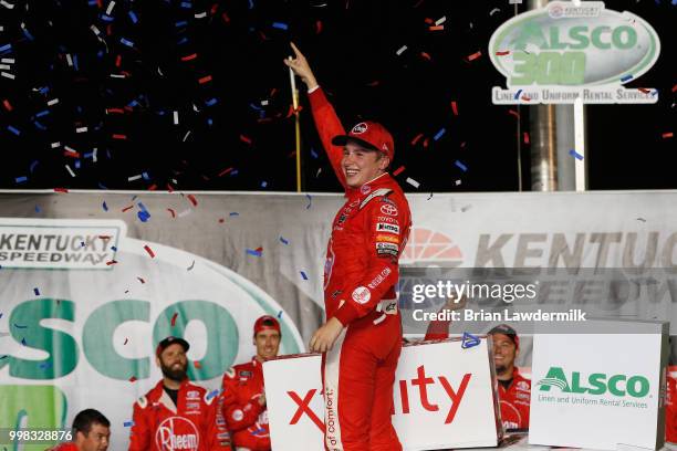 Christopher Bell, driver of the Rheem Toyota, celebrates in Victory Lane after winning the NASCAR Xfinity Series Alsco 300 at Kentucky Speedway on...