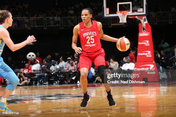 Monique Currie of the Washington Mystics handles the ball against the Chicago Sky on June 13, 2018 at Capital One Arena in Washington, DC. NOTE TO...