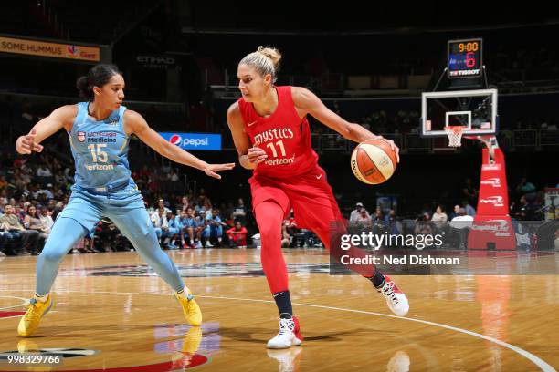 Elena Delle Donne of the Washington Mystics handles the ball against Gabby Williams of the Chicago Sky on June 13, 2018 at Capital One Arena in...