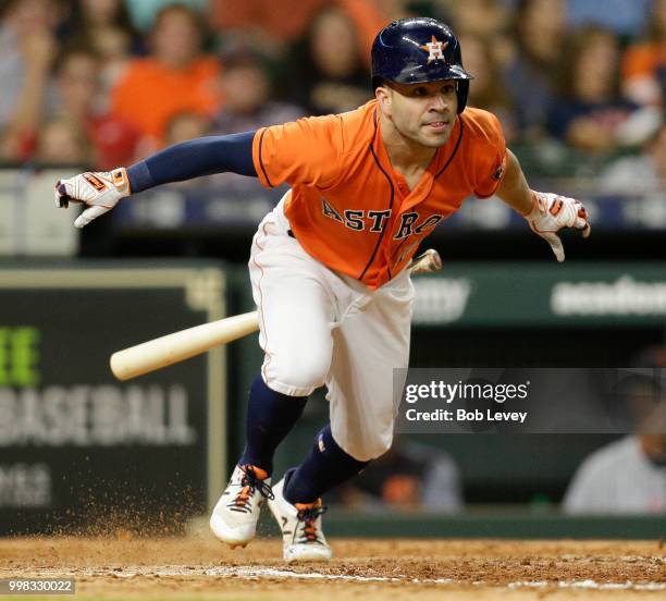 Jose Altuve of the Houston Astros singles in the eighth inning against the Detroit Tigers at Minute Maid Park on July 13, 2018 in Houston, Texas.