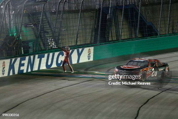 Christopher Bell, driver of the Rheem Toyota, celebrates winning the NASCAR Xfinity Series Alsco 300 at Kentucky Speedway on July 13, 2018 in Sparta,...