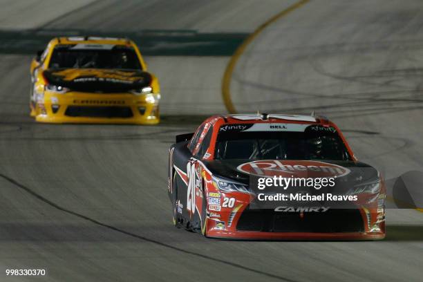 Christopher Bell, driver of the Rheem Toyota, leads Daniel Hemric, driver of the South Point Hotel & Casino Chevrolet, during the NASCAR Xfinity...