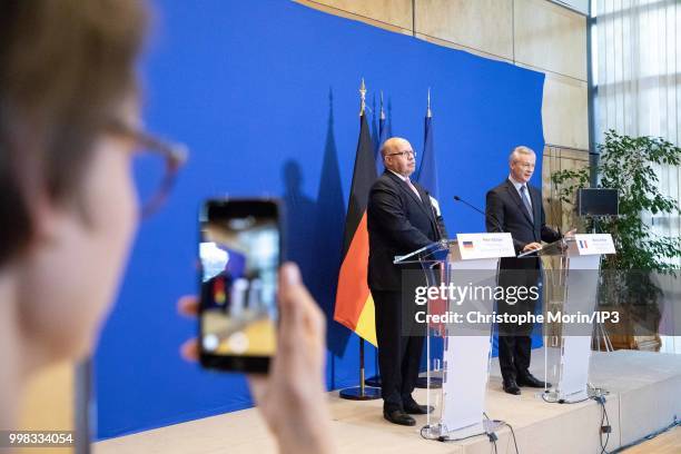 German Economy Minister Peter Altmaier and French Minister of economy, Bruno Le Maire speak during a joint press conference on July 11, 2018 in...