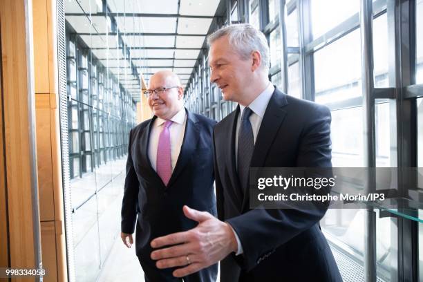 German Economy Minister Peter Altmaier and French Minister of economy, Bruno Le Maire leave a joint meeting for going to press conference on July 11,...