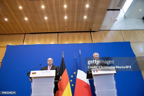 German Economy Minister Peter Altmaier and French Minister of economy, Bruno Le Maire speak during a joint press conference on July 11, 2018 in...