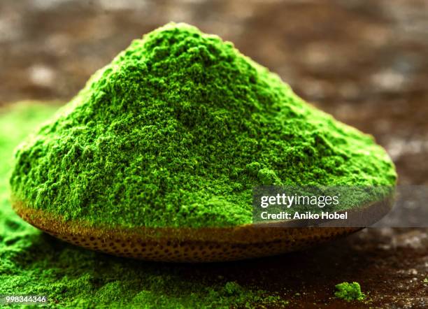 green powder - alga foto e immagini stock