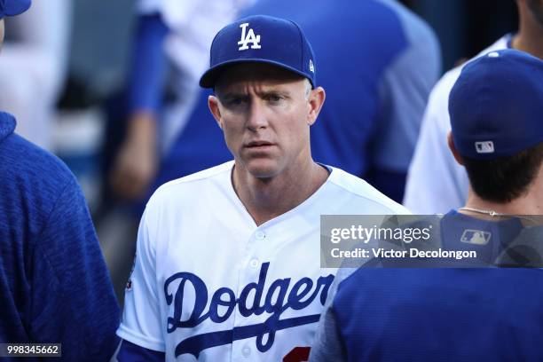 Chase Utley of the Los Angeles Dodgers looks on from the dugout just prior to the start of the MLB game against the Los Angeles Angels of Anaheim at...