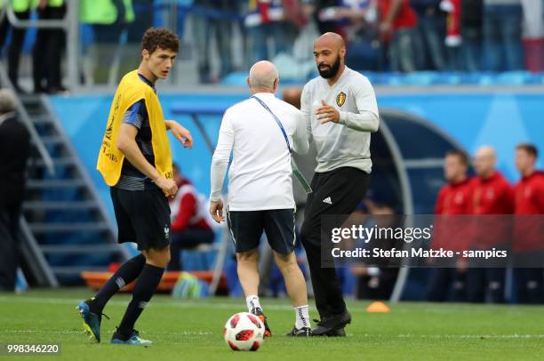 Thierry Henry Assistent of Belgien Benjamin Pavard of France during the 2018 FIFA World Cup Russia Semi Final match between Belgium and France at...