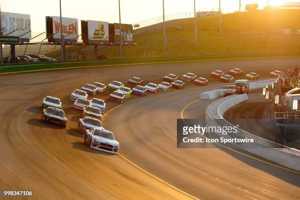 Cole Custer Stewart-Haas Racing Ford Mustang leads the field through turn two during the NASCAR Xfinity Series Alsco 300 on July 13th at Kentucky...