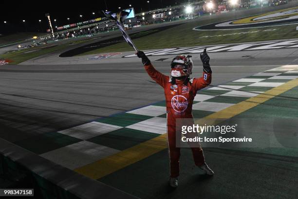 Christopher Bell Joe Gibbs Racing Toyota Camry grabs the checkered flag after winning the NASCAR Xfinity Series Alsco 300 on July 13th at Kentucky...