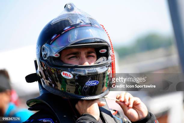Ty Majeski Roush Fenway Racing Ford Mustang straps on his helmet before qualifying for the NASCAR Xfinity Series Alsco 300 on July 13th at Kentucky...