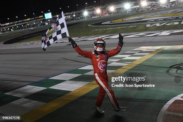 Christopher Bell Joe Gibbs Racing Toyota Camry grabs the checkered flag after winning the NASCAR Xfinity Series Alsco 300 on July 13th at Kentucky...