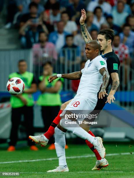 Sime Vrsaljko of Croatia and Jordan Henderson of England battle for the ball during the 2018 FIFA World Cup Russia Semi Final match between Croatia...