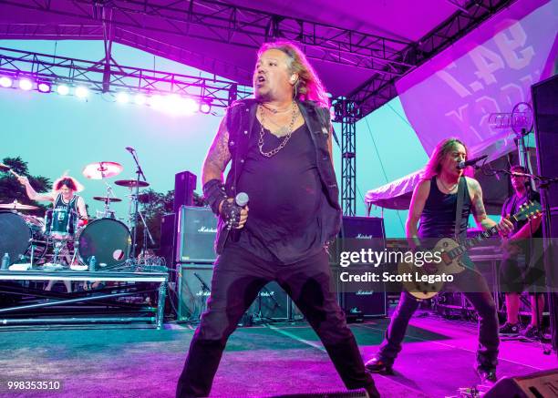 Zoltan Chaney, Vince Neil former lead singer of Motley Crue and Jeff Blando perform at Detroit Riverfront on July 13, 2018 in Detroit, Michigan.