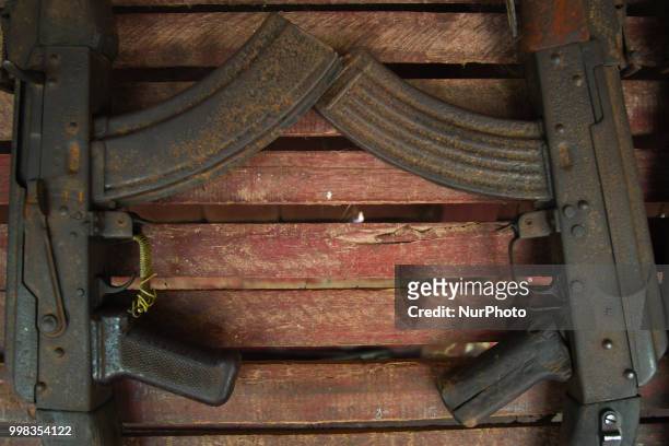 Couple of partially-rusted AK-47, also known as the Kalashnikov, used during the Cambodian War, exhibited at the War Museum, Siem Reap. On Saturday,...