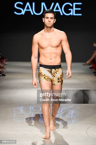 Model walks the runway for Sauvage Swimwear at Miami Swim Week powered by Art Hearts Fashion Swim/Resort 2018/19 at Faena Forum on July 13, 2018 in...