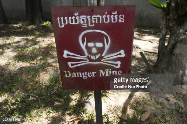 Warning board 'Danger Mine', exhibited at the War Museum, Siem Reap. On Saturday, July 7 in Siem Reap, Cambodia.
