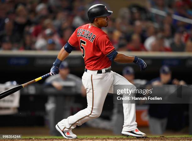 Eduardo Escobar of the Minnesota Twins hits an RBI single against the Tampa Bay Rays during the sixth inning of the game on July 13, 2018 at Target...