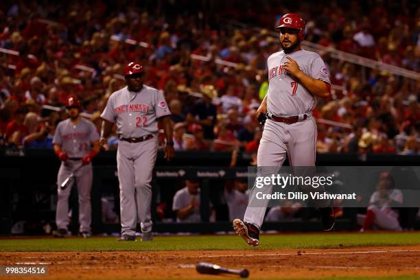 Eugenio Suarez of the Cincinnati Reds scores a run against the St. Louis Cardinals in the eighth inning at Busch Stadium on July 13, 2018 in St....