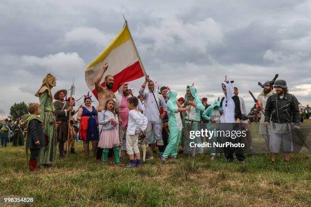 People dresses as a Gay pride participants are seen in Grunwald, Poland on 13 July 2018 Battle of Grunwald reenactment participants take part in the...