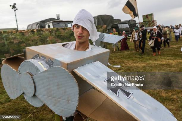Man dressed as a German WWII airplane is seen in Grunwald, Poland on 13 July 2018 Battle of Grunwald reenactment participants take part in the last...