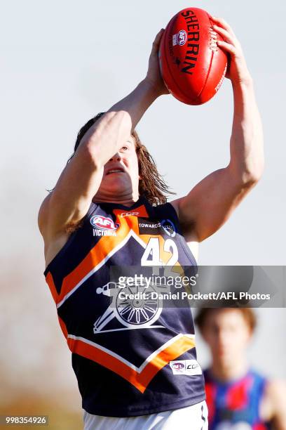 Nathan Croft of the Cannons marks the ball during the round 12 TAC Cup match between Oakleigh and Calder at Warrawee Park on July 14, 2018 in...