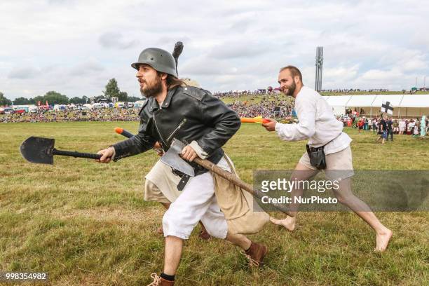 People dressed in a funny way are seen in Grunwald, Poland on 13 July 2018 Battle of Grunwald reenactment participants take part in the last...