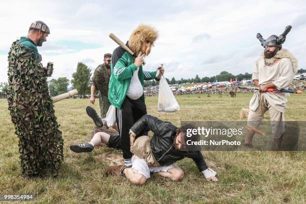 People dressed in a funny way are seen in Grunwald, Poland on 13 July 2018 Battle of Grunwald reenactment participants take part in the last...