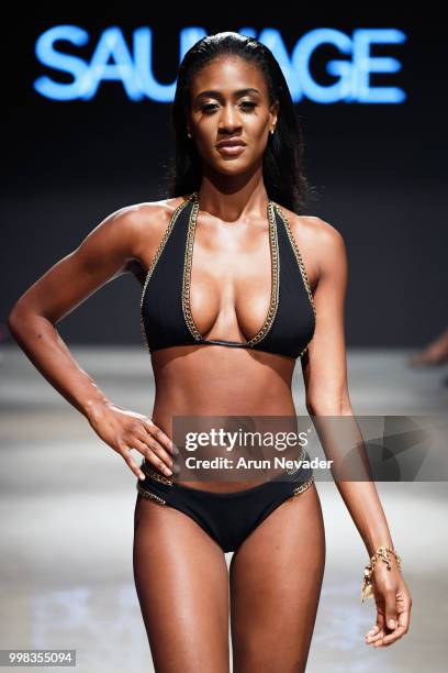 Model walks the runway for Sauvage Swimwear at Miami Swim Week powered by Art Hearts Fashion Swim/Resort 2018/19 at Faena Forum on July 13, 2018 in...