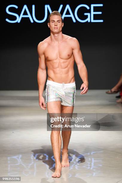 Model walks the runway for Sauvage Swimwear at Miami Swim Week powered by Art Hearts Fashion Swim/Resort 2018/19 at Faena Forum on July 13, 2018 in...