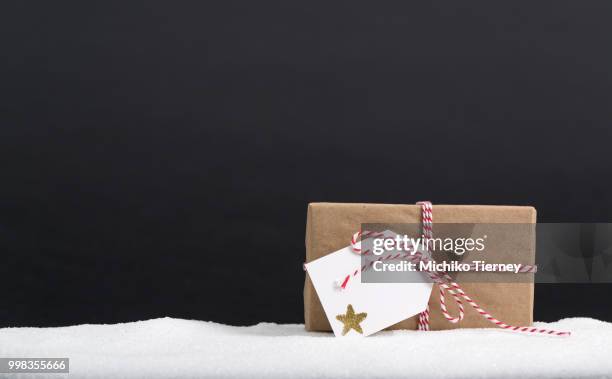 present box on a black background - black box packaging stock pictures, royalty-free photos & images