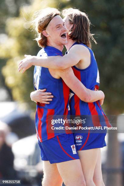 Dylan Williams of the Chargers celebrates a goal with Noah Anderson of the Chargers during the round 12 TAC Cup match between Oakleigh and Calder at...