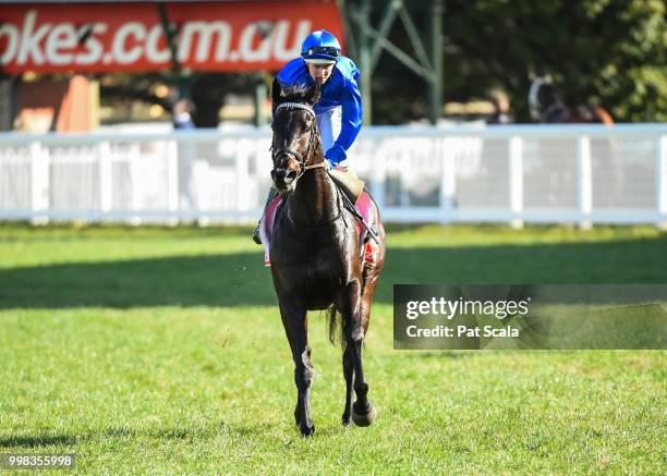 Damian Lane returns to the mounting yard on Demolition after winning the Ladbrokes Multiverse Handicap , at Caulfield Racecourse on July 14, 2018 in...