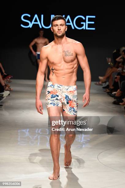 Model walks the runway for Sauvage Swimwear at Miami Swim Week powered by Art Hearts Fashion Swim/Resort 2018/19 at Faena Forum on July 13, 2018 in...