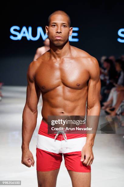 Model walks the runway for Sauvage Swimwear at Miami Swim Week powered by Art Hearts Fashion Swim/Resort 2018/19 at Faena Forum on July 13, 2018 in...