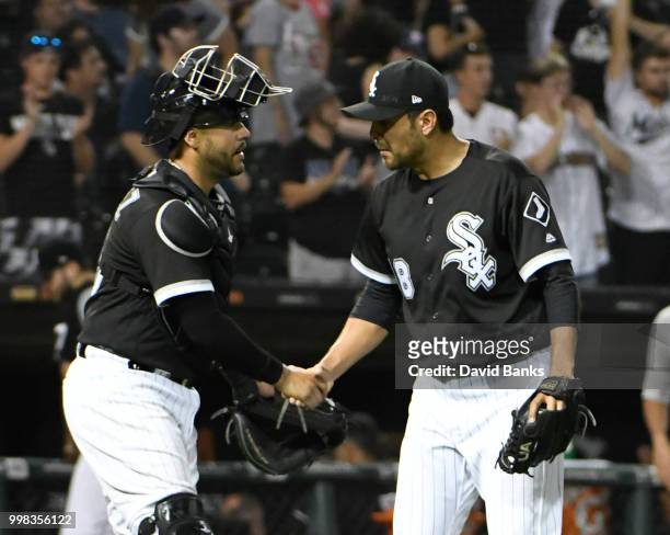 Omar Narvaez of the Chicago White Sox and Joakim Soria celebrate their win against the Kansas City Royals on July 13, 2018 at Guaranteed Rate Field...